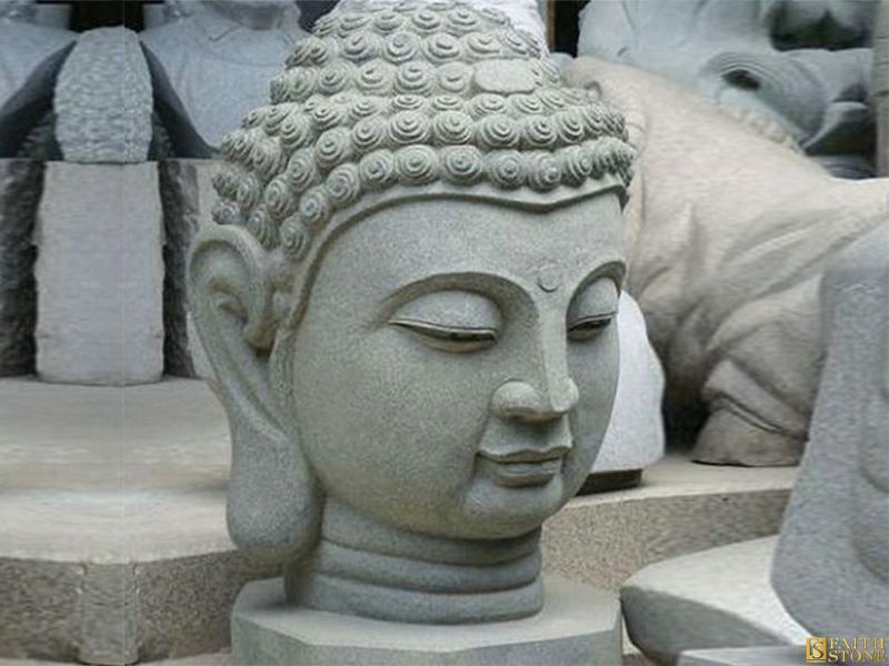 Скульптура головы Будды